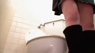 Lusty Japanese hoe fucked a massive dildo in a toilet