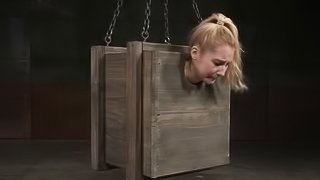 Odette finds herself in wooden box with the black cock close to her