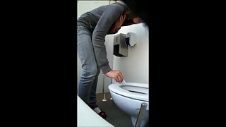 Cute Girl Exposes Nice Ass and Sits Down on the Toilet