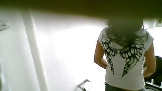 Dark haired dark skinned girl in a domestic pissing porno vid