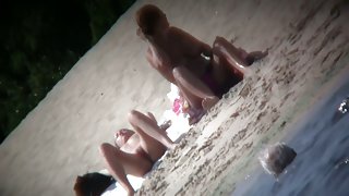 Genius beach voyeur video of girls spreading their legs