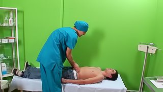 Gay undressing a cute patient and giving him steamy ball licking