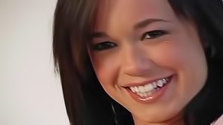 Cute smiling teen brings out tits