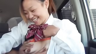 College girl starts to loose control when his friend pinches her nipples at a car