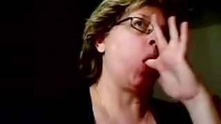 Horny brunette granny with big natural tits milks her fat husband's small but fat dick