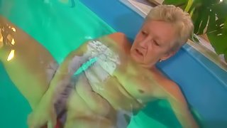 Lesbian granny and nice woman masturbating together, water games