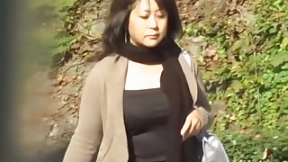 Plump Japanese MILF recorded with no panties during sharking