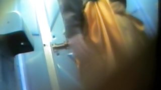 Pissing in a toilet girl showing her hot round booty